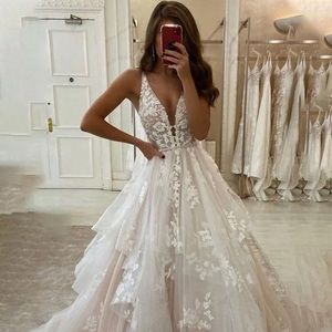A-line Tulle V-neck Sleeveless Applique Sweep Train Wedding Dress